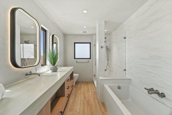 Bathroom, Dual Sink Vanities, Glass Shower, Interior, Marble Walls, Recessed Lighting, Wood Texture Flooring