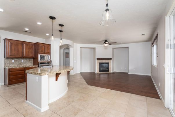 Fireplace, Interior, Kitchen, Pendant Lights, Recessed Lighting, Wood Texture Flooring
