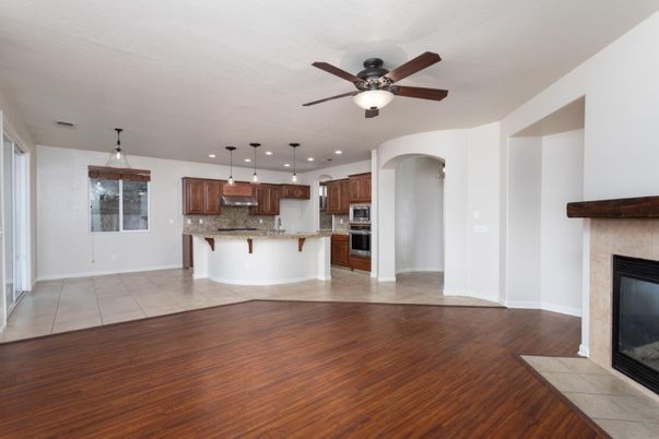 Fireplace, Interior, Kitchen, Pendant Lights, Recessed Lighting, Stainless Steel Appliances, Wood Texture Flooring