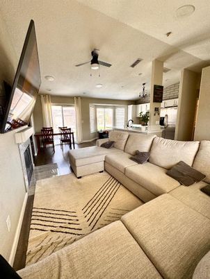 Dining room, Fireplace, Interior, Living room, Recessed Lighting, Wood Texture Flooring