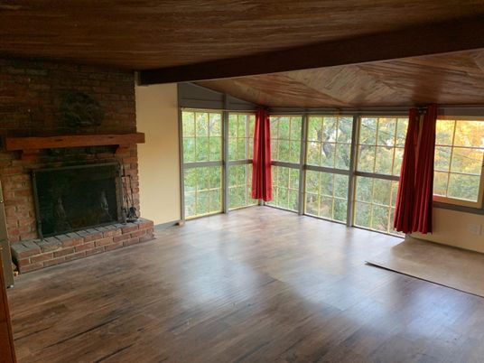 Empty room, Fireplace, Interior, Stone Walls, Wooden Ceilings, Wood Texture Flooring