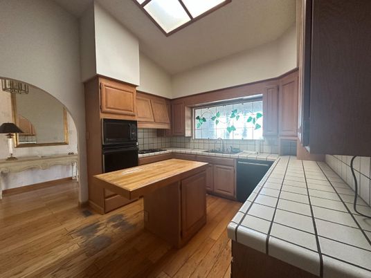 Interior, Kitchen, Tile Countertops, Wood Texture Flooring