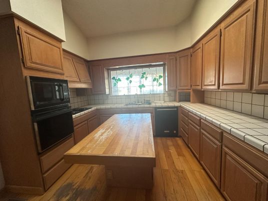 Interior, Kitchen, Tile Countertops, Wood Texture Flooring