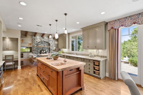 Fireplace, Interior, Kitchen, Living room, Pendant Lights, Recessed Lighting, Stainless Steel Appliances, Wood Texture Flooring
