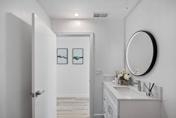 Bathroom, Dual Sink Vanities, Interior, Recessed Lighting, Wood Texture Flooring