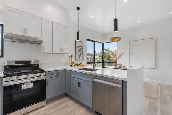 Interior, Kitchen, Pendant Lights, Recessed Lighting, Stainless Steel Appliances, Wood Texture Flooring