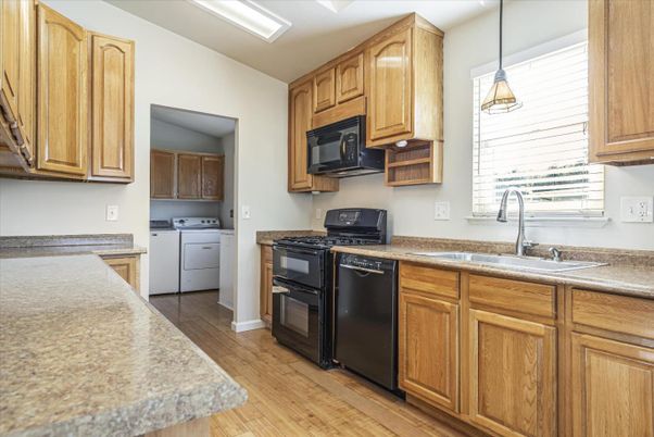 Interior, Kitchen, Pendant Lights, Washer, Wood Texture Flooring