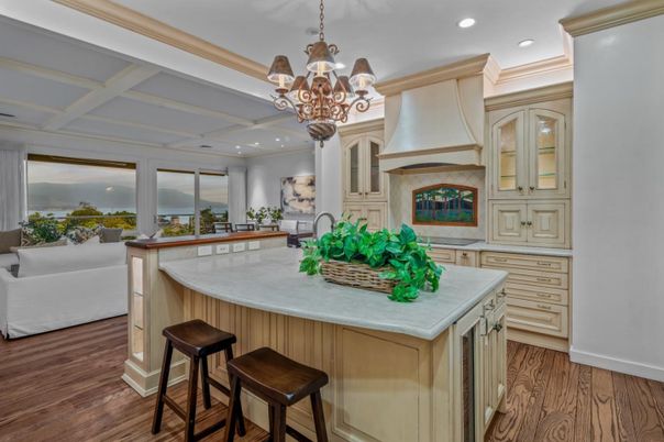Chandelier, Fireplace, Interior, Kitchen, Living room, Recessed Lighting, Wood Texture Flooring