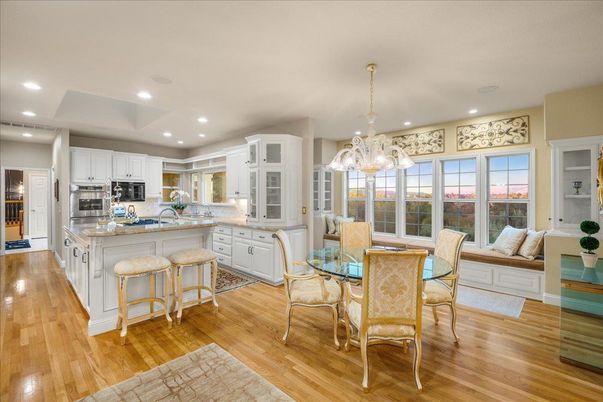 Chandelier, Dining room, Interior, Kitchen, Recessed Lighting, Stainless Steel Appliances, Wood Texture Flooring