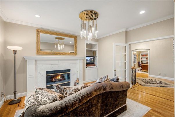 Chandelier, Fireplace, Interior, Living room, Recessed Lighting, Wood Texture Flooring