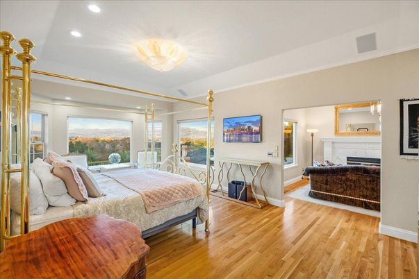 Bedroom, Fireplace, Interior, Recessed Lighting, Wood Texture Flooring
