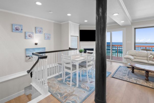 Dining room, Fireplace, Interior, Recessed Lighting, Water, Wood Texture Flooring