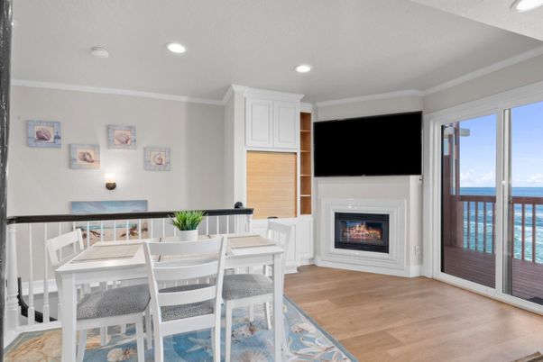 Dining room, Fireplace, Interior, Recessed Lighting, Water, Wood Texture Flooring