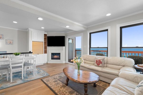 Dining room, Fireplace, Interior, Living room, Recessed Lighting, Water, Wood Texture Flooring