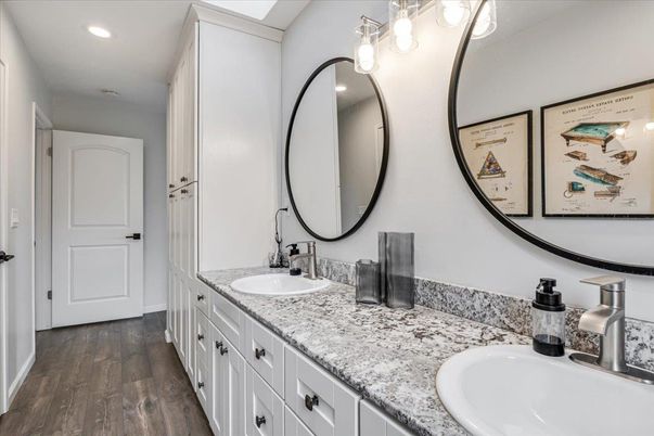 Bathroom, Dual Sink Vanities, Interior, Recessed Lighting, Wood Texture Flooring