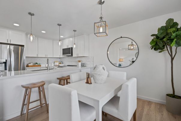 Dining room, Interior, Kitchen, Pendant Lights, Recessed Lighting, Stainless Steel Appliances, Wood Texture Flooring