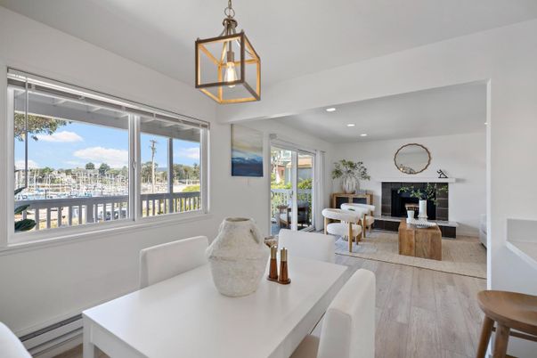 Dining room, Fireplace, Interior, Living room, Pendant Lights, Recessed Lighting, Wood Texture Flooring