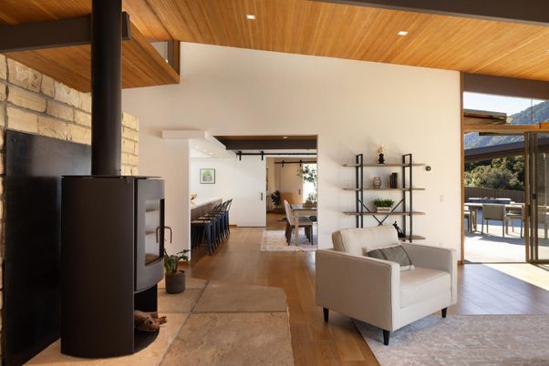 Dining room, Fireplace, Interior, Recessed Lighting, Stone Walls, Wooden Ceilings, Wood Texture Flooring