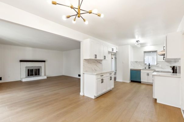 Fireplace, Interior, Kitchen, Marble Walls, Pendant Lights, Wood Texture Flooring