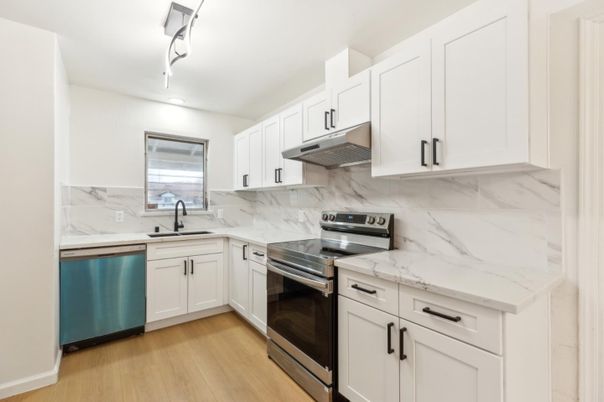 Interior, Kitchen, Marble Walls, Stainless Steel Appliances, Wood Texture Flooring