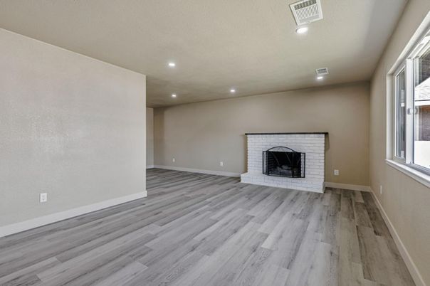 Empty room, Fireplace, Interior, Recessed Lighting, Wood Texture Flooring