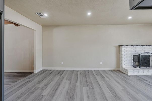 Empty room, Fireplace, Interior, Recessed Lighting, Wood Texture Flooring