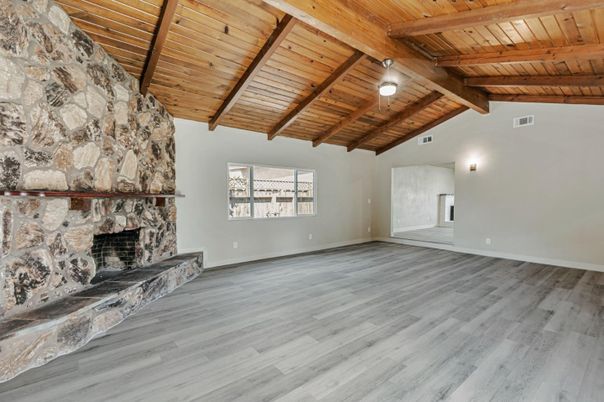 Empty room, Fireplace, Interior, Stone Walls, Wooden Beams, Wooden Ceilings, Wood Texture Flooring