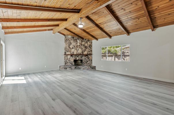 Empty room, Fireplace, Interior, Stone Walls, Wooden Beams, Wooden Ceilings, Wood Texture Flooring