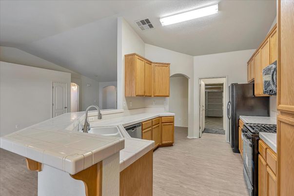 Interior, Kitchen, Tile Countertops, Wood Texture Flooring