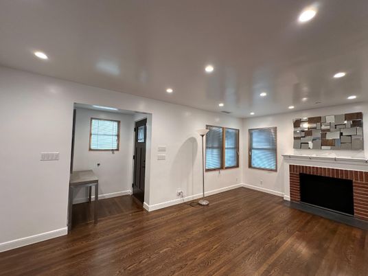 Empty room, Fireplace, Interior, Recessed Lighting, Wood Texture Flooring