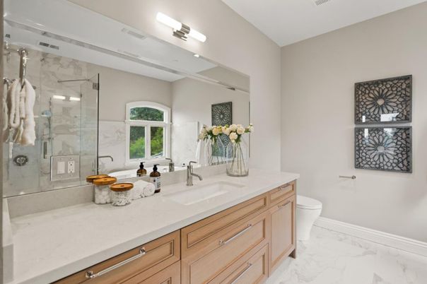 Bathroom, Dual Sink Vanities, Glass Shower, Interior, Marble, Marble Walls, Recessed Lighting