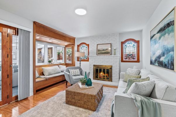 Fireplace, Interior, Living room, Recessed Lighting, Stone Walls, Wood Texture Flooring