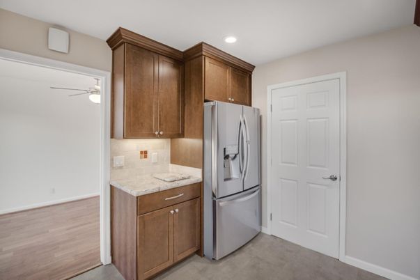 Interior, Kitchen, Recessed Lighting, Washer, Wood Texture Flooring