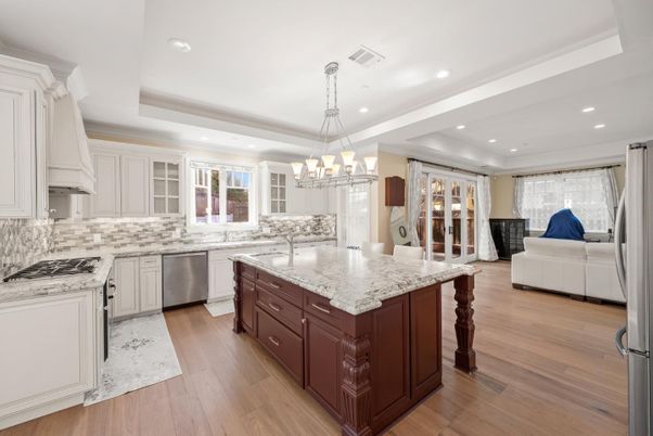 Chandelier, Interior, Kitchen, Pendant Lights, Recessed Lighting, Stainless Steel Appliances, Wood Texture Flooring