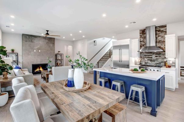 Dining room, Fireplace, Interior, Kitchen, Living room, Recessed Lighting, Stainless Steel Appliances, Stone Walls, Wood Texture Flooring