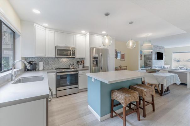 Interior, Kitchen, Pendant Lights, Recessed Lighting, Stainless Steel Appliances, Wood Texture Flooring