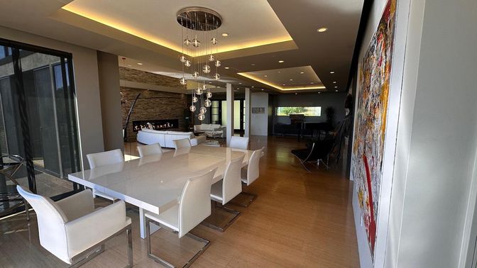 Dining room, Fireplace, Interior, Living room, Pendant Lights, Recessed Lighting, Stone Walls, Wood Texture Flooring