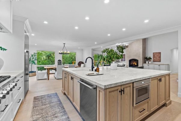 Dining room, Fireplace, Interior, Kitchen, Living room, Pendant Lights, Recessed Lighting, Stainless Steel Appliances, Wood Texture Flooring