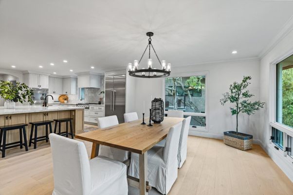 Chandelier, Dining room, Interior, Kitchen, Pendant Lights, Recessed Lighting, Stainless Steel Appliances, Wood Texture Flooring