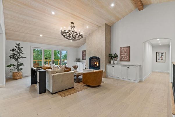 Chandelier, Fireplace, Interior, Living room, Recessed Lighting, Wooden Beams, Wooden Ceilings, Wood Texture Flooring