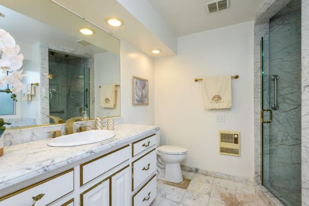 Bathroom, Dual Sink Vanities, Glass Shower, Interior, Marble, Marble Walls, Recessed Lighting