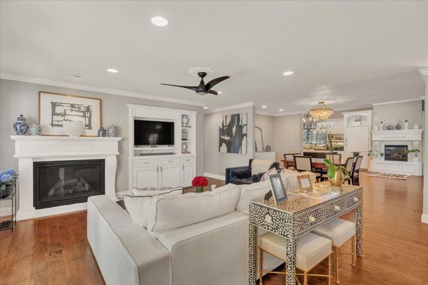 Chandelier, Dining room, Fireplace, Interior, Living room, Recessed Lighting, Wood Texture Flooring