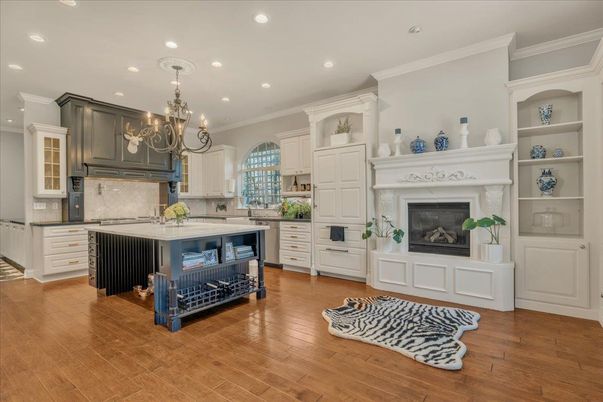Chandelier, Fireplace, Interior, Kitchen, Recessed Lighting, Wood Texture Flooring