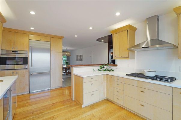 Chandelier, Dining room, Interior, Kitchen, Recessed Lighting, Stainless Steel Appliances, Wood Texture Flooring