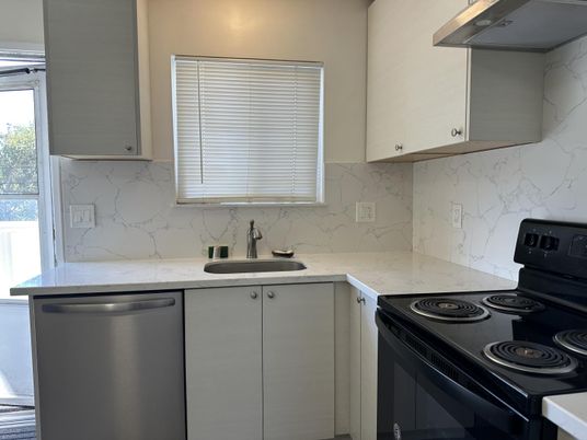 Interior, Kitchen, Marble Walls, Stainless Steel Appliances