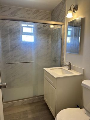 Bathroom, Glass Shower, Interior, Marble Walls, Wood Texture Flooring