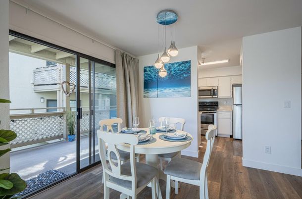 Dining room, Interior, Kitchen, Pendant Lights, Stainless Steel Appliances, Wood Texture Flooring