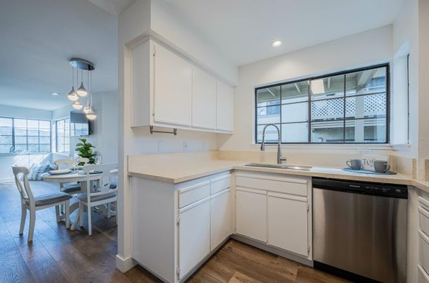 Dining room, Interior, Kitchen, Pendant Lights, Recessed Lighting, Stainless Steel Appliances, Wood Texture Flooring