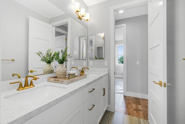 Bathroom, Dual Sink Vanities, Interior, Recessed Lighting, Wood Texture Flooring