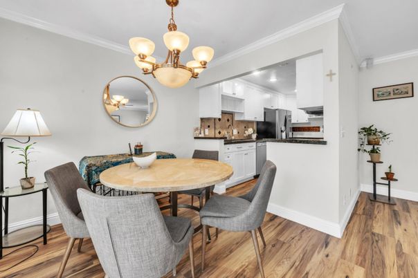 Chandelier, Dining room, Interior, Kitchen, Stainless Steel Appliances, Wood Texture Flooring